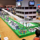 Gravity feed racetrack